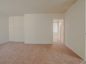 Sherman Oaks apartment for rent - A room with a carpeted floor and white walls.