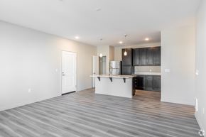 Troutdale apartment for rent - A kitchen with a white countertop and black cabinets.
