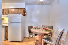 Albuquerque apartment for rent - A kitchen with a table set for two.