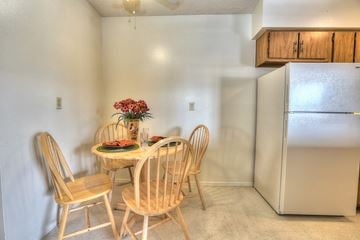 Albuquerque apartment for rent - A kitchen with a table and chairs.