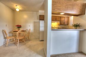 Albuquerque apartment for rent - A dining room with a table and chairs.