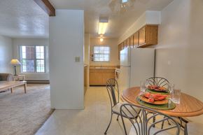 Albuquerque apartment for rent - A dining room with a table set for two.