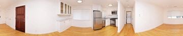 Palo Alto apartment for rent - an empty kitchen with white walls and a refrigerator