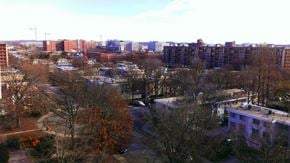 Washington apartment for rent - a view of a city with buildings and trees