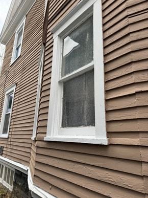 Syracuse apartment for rent - a window on the side of a house