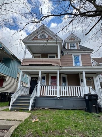 Syracuse apartment for rent - a house with a porch and a mail box