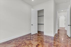 Horseshoe Bay house for rent - a living room with white walls and a door to a closet