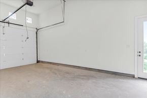 Horseshoe Bay house for rent - a garage with a white wall and a door