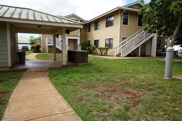 Lanai City apartment for rent - a sidewalk in front of a house