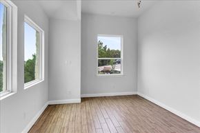 Horseshoe Bay house for rent - a living room with wood floors and a large window