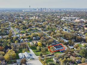 San Antonio apartment for rent - an aerial view of a neighborhood with a city in the background