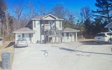 Lincoln apartment for rent - A house with a car parked in front of it.