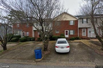 Anniston house for rent - a white car parked in front of a house