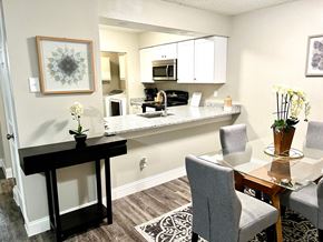 Irving house for rent - a kitchen and dining area with a table and chairs