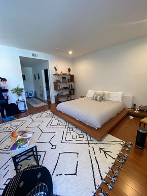 Los Angeles apartment for rent - a bedroom with a bed and a rug in a house