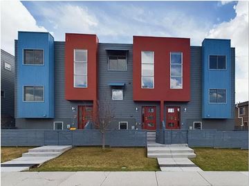 Phoenix apartment for rent - a blue and red house with a sidewalk in front of it