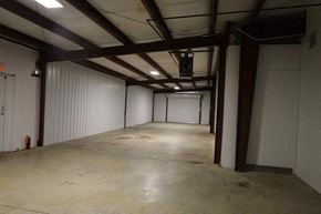 N.Chesterfield apartment for rent - A large, empty warehouse with a concrete floor and white walls.