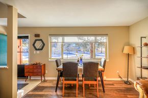 Pagosa Springs house for rent - a dining room with a table and a window