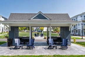 Norwell apartment for rent - a gazebo with chairs and tables on a patio