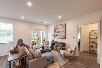 Norwell apartment for rent - a living room with couches and chairs and a table