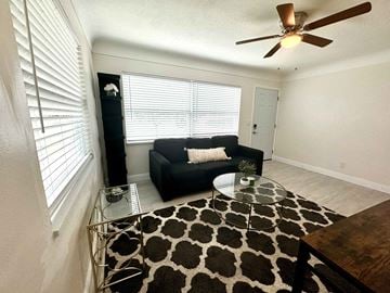 St Petersburg house for rent - a living room with a couch and a coffee table