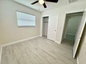 St Petersburg house for rent - an empty room with a ceiling fan and a door to a closet