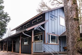 Tigard apartment for rent - A blue building with the words "Community Building" on the side.