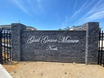 Lindenhurst apartment for rent - a sign in front of a fence