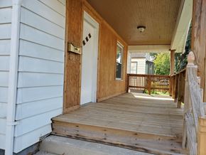 Lima house for rent - the front porch of a house with a wooden door