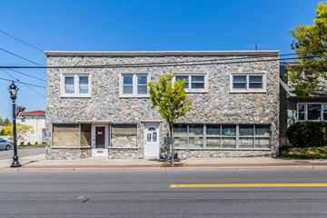 Carteret apartment for rent - a stone building on the side of a street