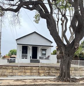 Santa Barbara apartment for rent - a white house with a large tree in front of it