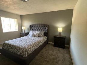 Scottsdale apartment for rent - a bedroom with a bed and two night stands