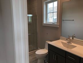Bridgeville apartment for rent - a bathroom with a toilet and a sink and a shower