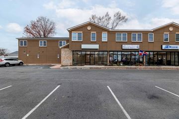 Woodbridge Township apartment for rent - the front of a building with a parking lot