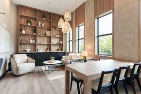 Lakeland apartment for rent - A modern dining room with a wooden table and chairs.
