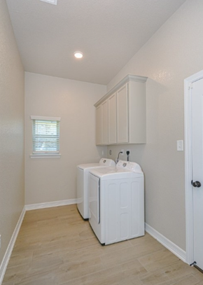 Killeen house for rent - the utility room has a washer and dryer and a window