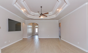 Killeen house for rent - the spacious living room with ceiling fan and hardwood flooring