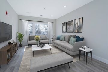 Hackensack apartment for rent - a living room with couches and a coffee table