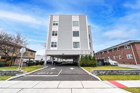 Hackensack apartment for rent - the apartment building has an overpass over the street