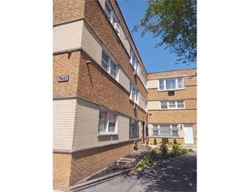 Chicago apartment for rent - A building with the number 2451 on it.