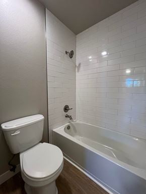 Fort Collins apartment for rent - a bathroom with a toilet and a bath tub