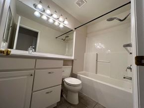 Boulder apartment for rent - a bathroom with a toilet and a tub and a sink
