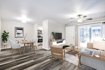 San Antonio apartment for rent - A living room with a dining table and chairs.