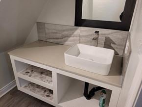 Hamilton house for rent - a small bathroom with a sink and a mirror