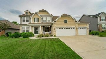 Saint John house for rent - a house with a large yard and a driveway