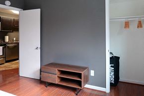 New Carrollton apartment for rent - a room with an open door and a wooden table
