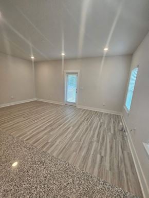 Pensacola house for rent - a living room with a hard wood floor and a window