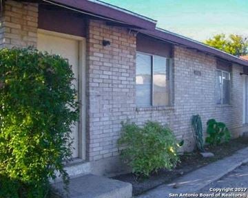 San Antonio apartment for rent - a brick house with a window on the side of it