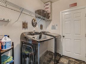 San Antonio house for rent - a small kitchen with a stove and a door