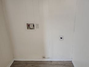 San Antonio house for rent - the wall of a room with a light switch on the wall
